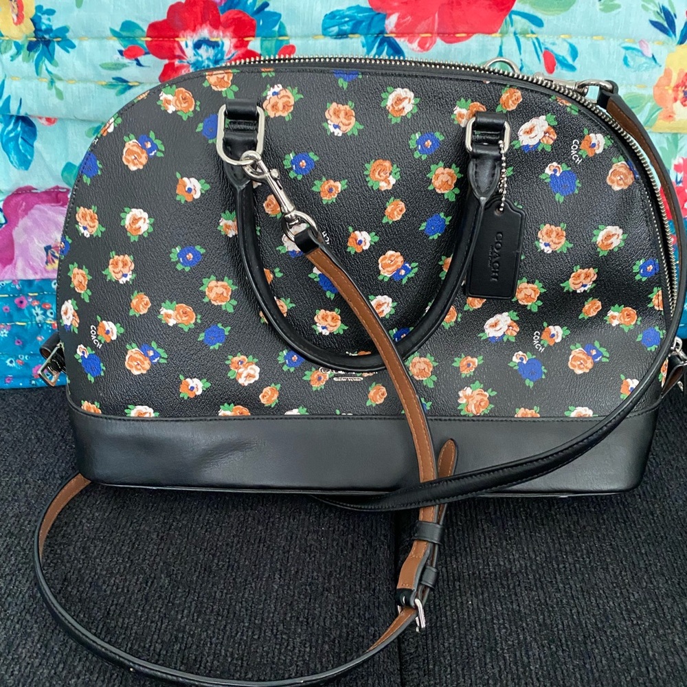 Black and floral leather Coach purse